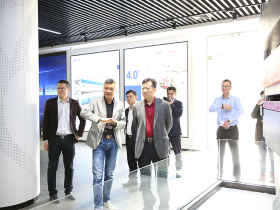 乐山万里石股份有限公司总裁邹鹏一行光临G库电竞调查领导